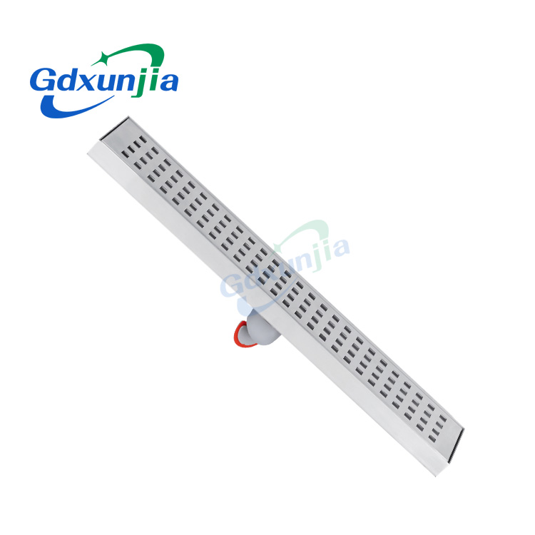 Salle de douche à grand déplacement en acier inoxydable avec siphon de sol à grille à trous rectangulaires